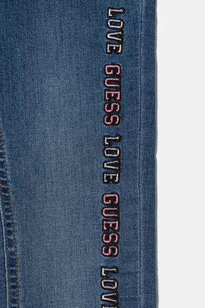 Jeans Guess con scritta per bambina